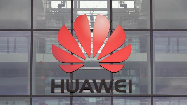 FILE PHOTO: Huawei logo is pictured on the headquarters building in Reading