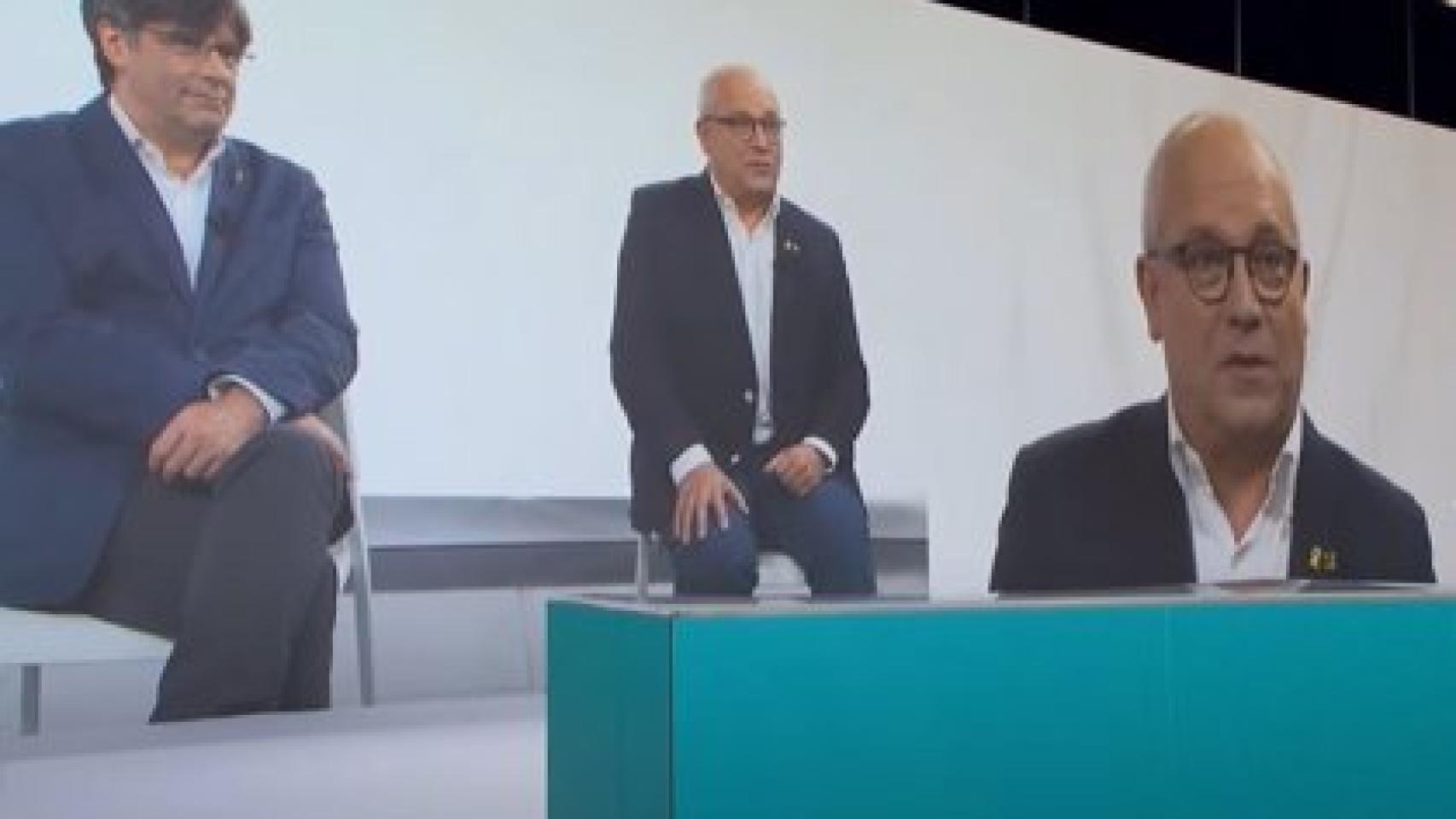 Lluís Puig, junto a Puigdemont en un acto de Junts per Catalunya./