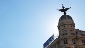 Detalle de la cúpula y figura del edificio de La Unión y el Fénix