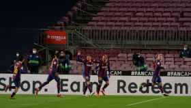 Los jugadores del Barça celebran el gol de Griezmann