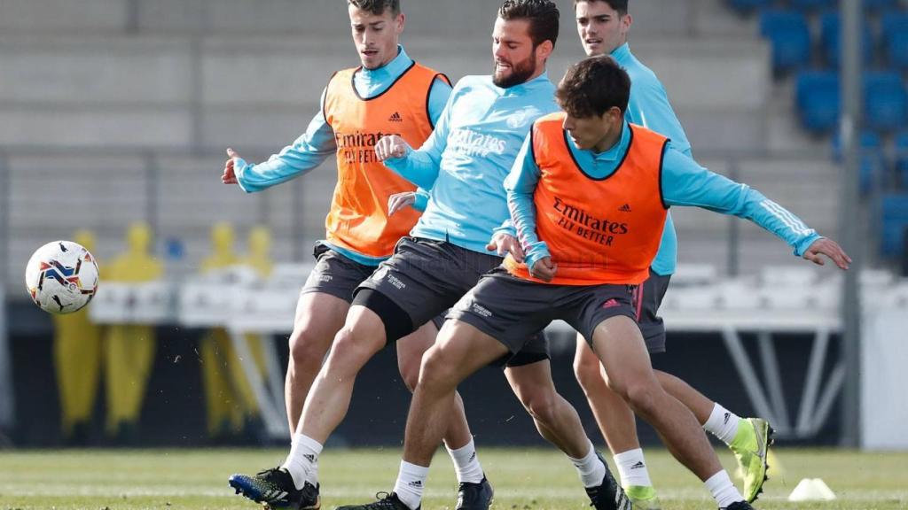 Antonio Blanco, Loren Aguado, Nacho Fernández y Miguel Gutiérrez, durante un entrenamiento del Real Madrid