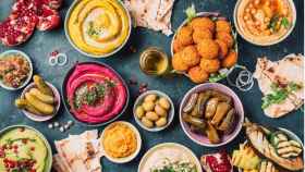 arabic-traditional-cuisine-middle-eastern-meze-with-pita-olives-picture-id1271870386