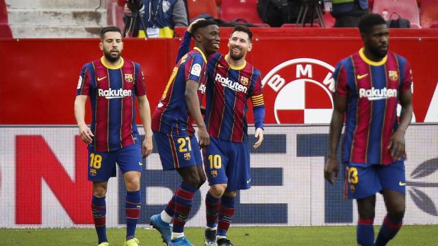 Messi y Dembélé celebran un gol