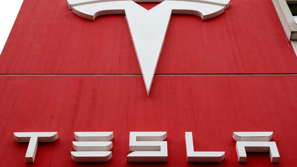 FILE PHOTO: The logo of car manufacturer Tesla is seen in Bern