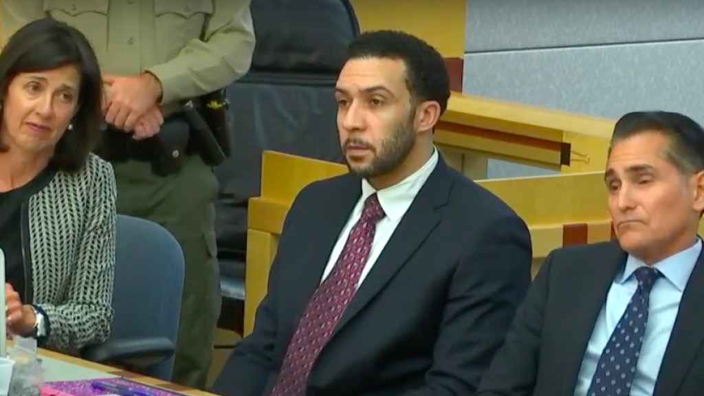 Kellen Winslow II en un juicio junto a sus abogados