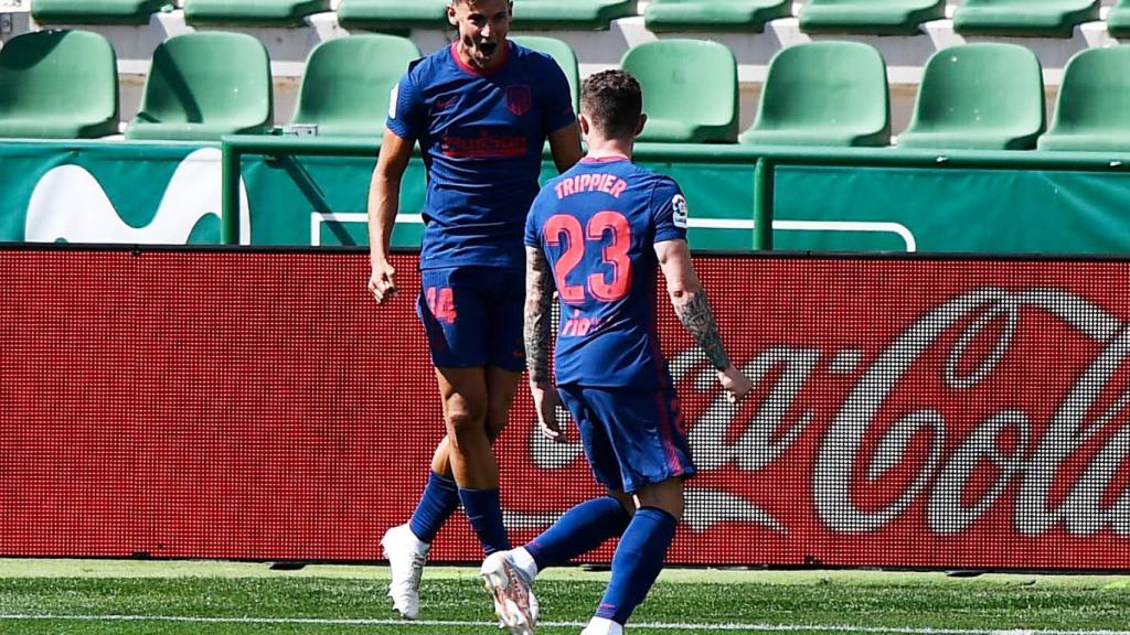 Marcos Llorente celebra su gol con Trippier