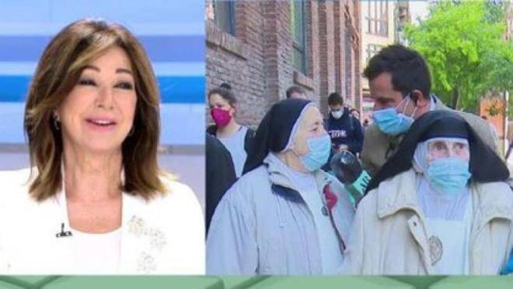 Ana Rosa Quintana sonríe mientras Jorge Luque entrevista a un grupo de monjas que esperaban para votar