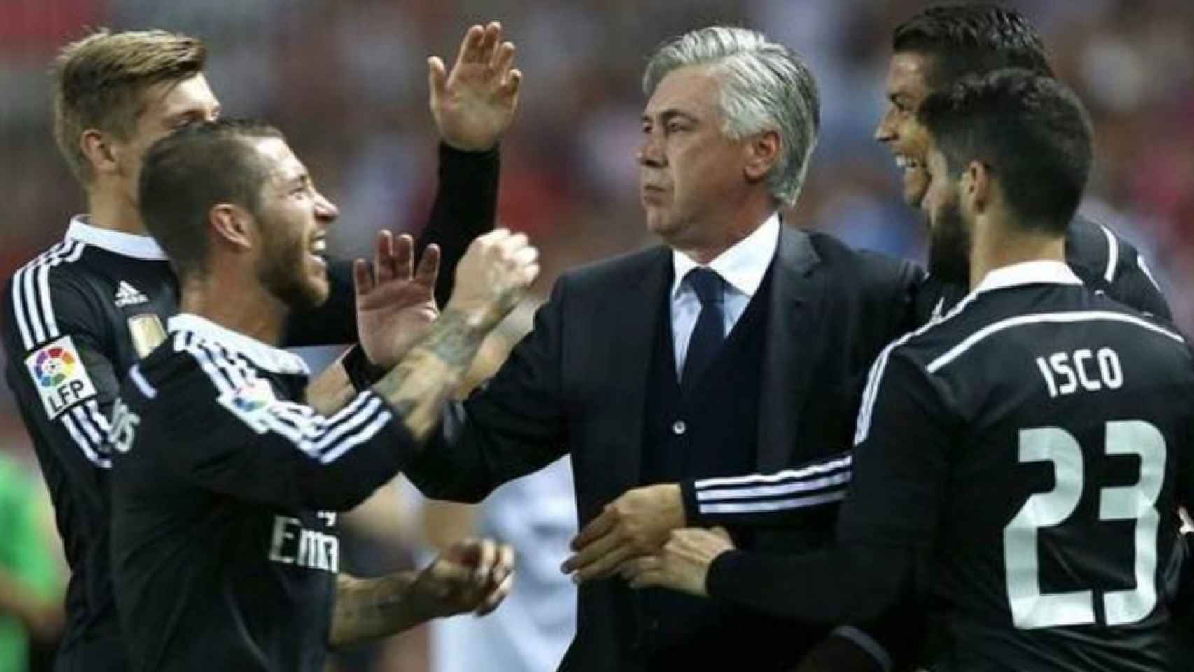 Ancelotti, con Sergio Ramos e Isco