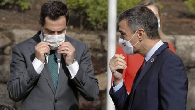 El presidente de la Junta de Andalucía, Juanma Moreno, y el del Gobierno, Pedro Sánchez.