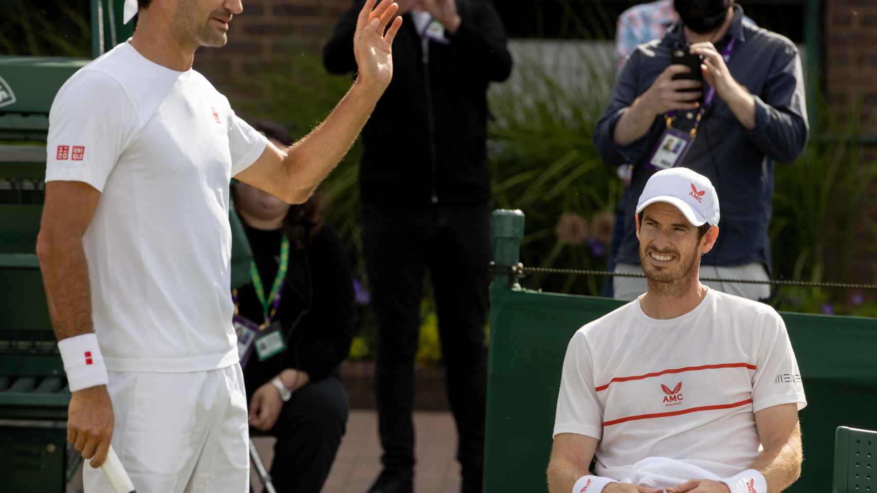 Federer en un entrenamiento con Murray en Wimbledon