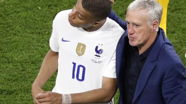 Mbappé y Deschamps