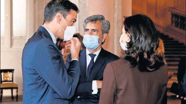 El presidente del Poder Judicial, Carlos Lesmes, con Pedro Sánchez y la ministra Llop el pasado 15 de julio./