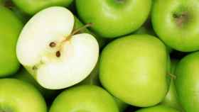 Unas manzanas verdes.