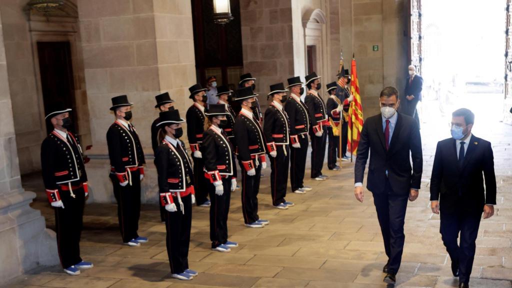 Ambos líderes, tras el saludo.