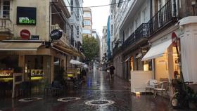 Las calles del centro de A Coruña en un día de lluvia y tormenta.