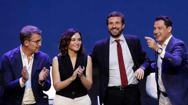 Núñez Feijóo, Díaz Ayuso, Pablo Casado y Juanma Moreno, este sábado en Valencia. EE