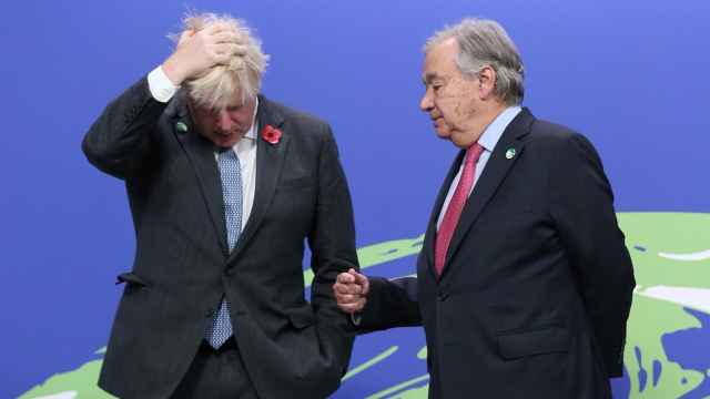 Antonio Guterres junto a Boris Johnson en Glasgow.