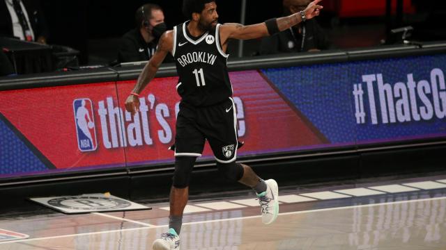 Kyrie Irving celebrando una canasta con los Nets