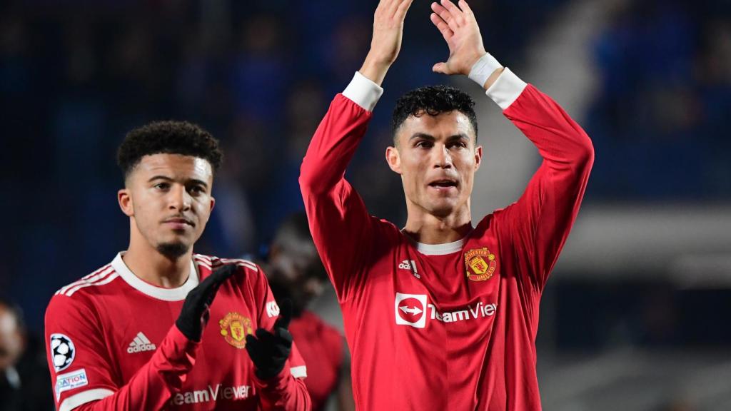 Jadon Sancho y Cristiano Ronaldo tras un partido con el Manchester United