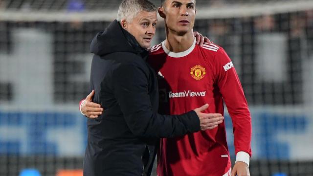 Cristiano Ronaldo y Ole Gunnar Solskjaer tras un partido del Manchester United