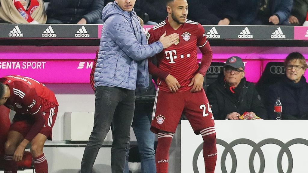 Corentin Tolisso, junto a Julian Nagelsmann.