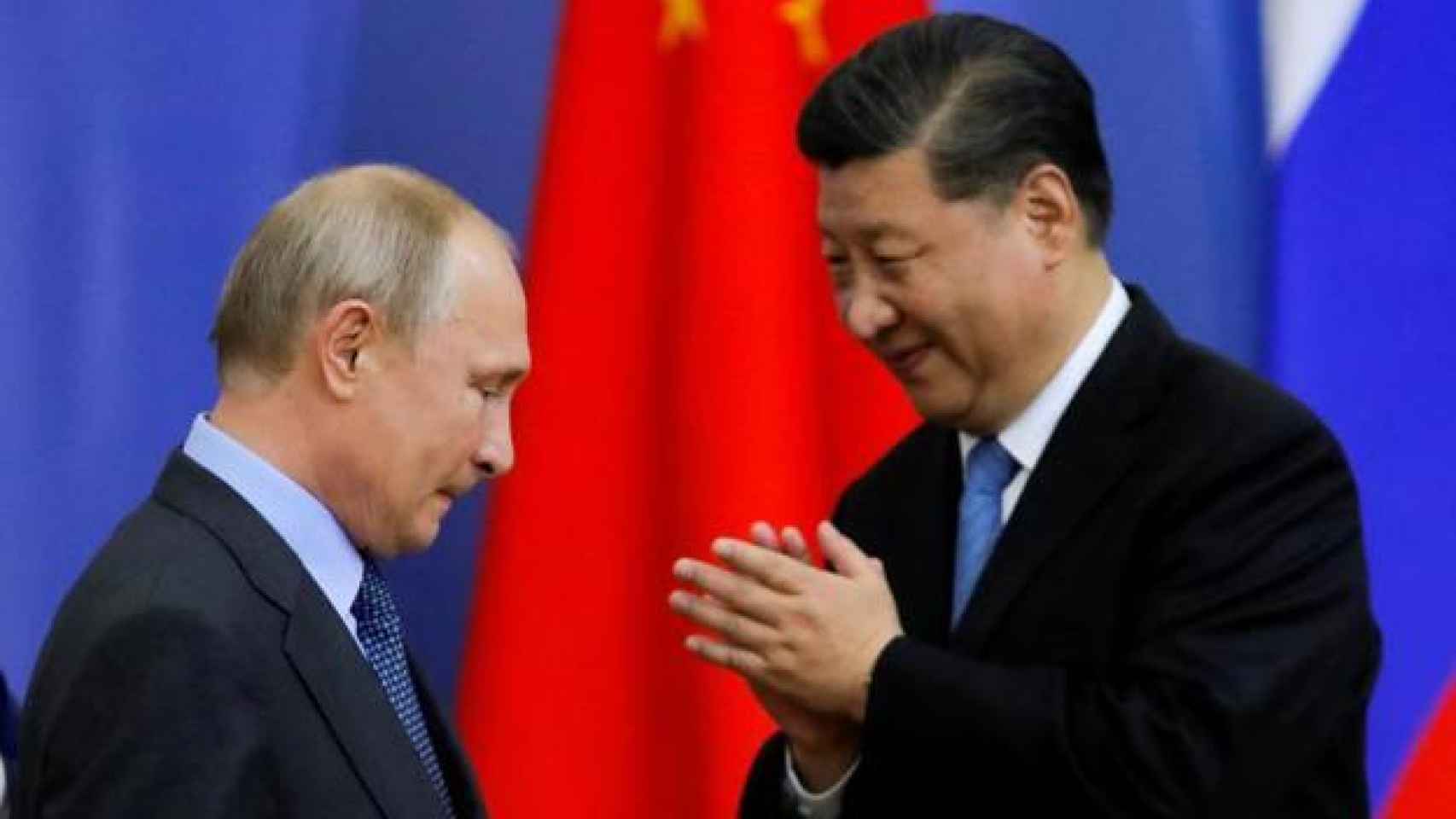 Vladimir Putin junto a Xi Jinping.