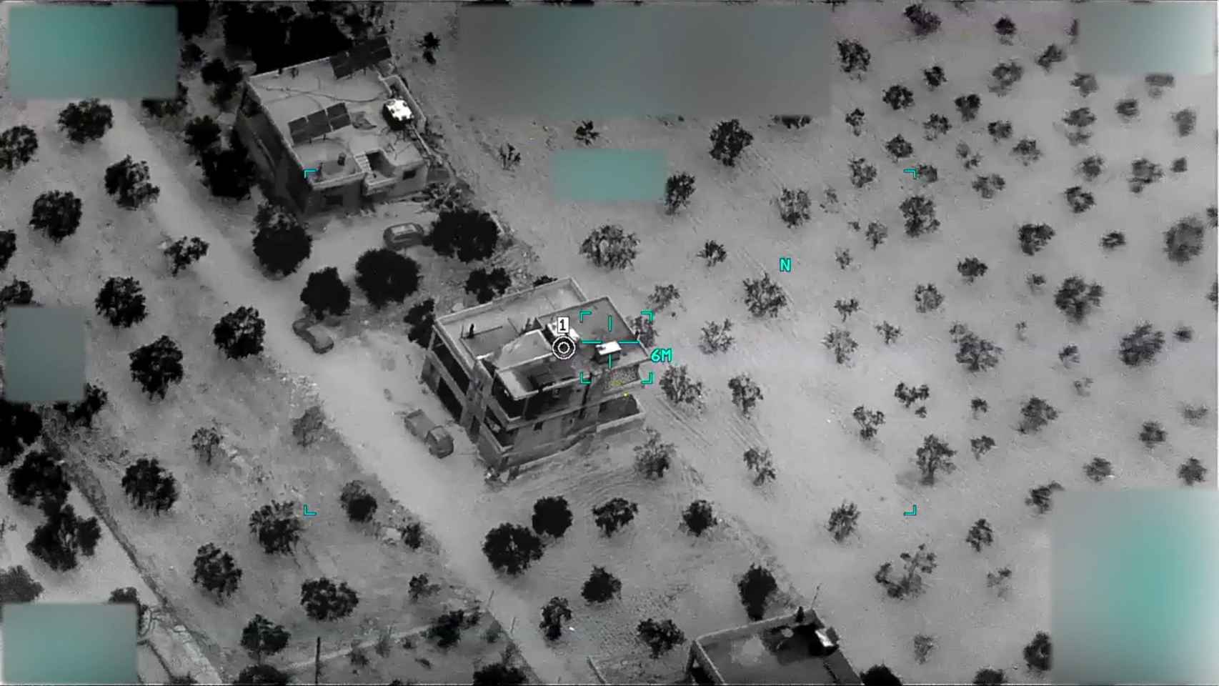 Una imagen aérea de vigilancia del edificio donde vivía el líder de ISIS.
