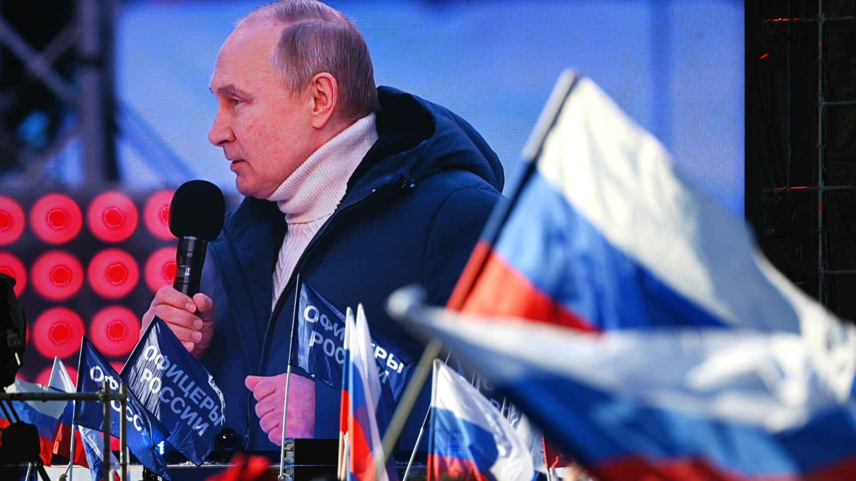 Vladímir Putin con parka Loro Piana y jersey Kiton.