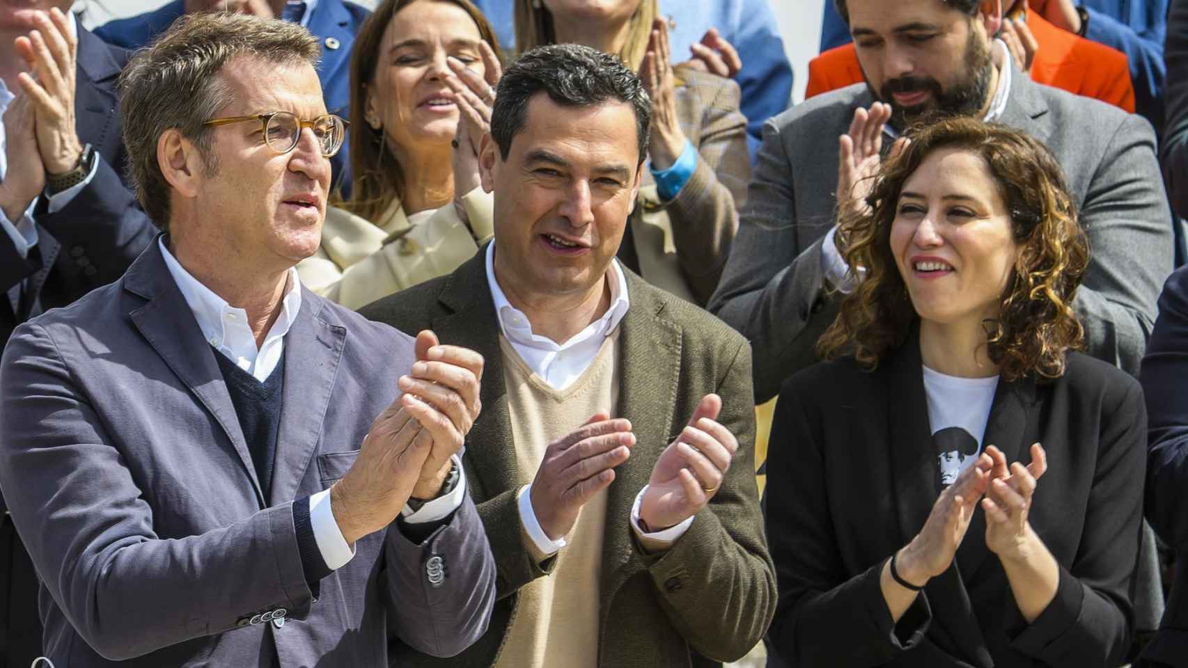 Alberto Núñez Feijóo, Juanma Moreno e Isabel Díaz Ayuso, en el XX Congreso Nacional del PP celebrado en Sevilla.