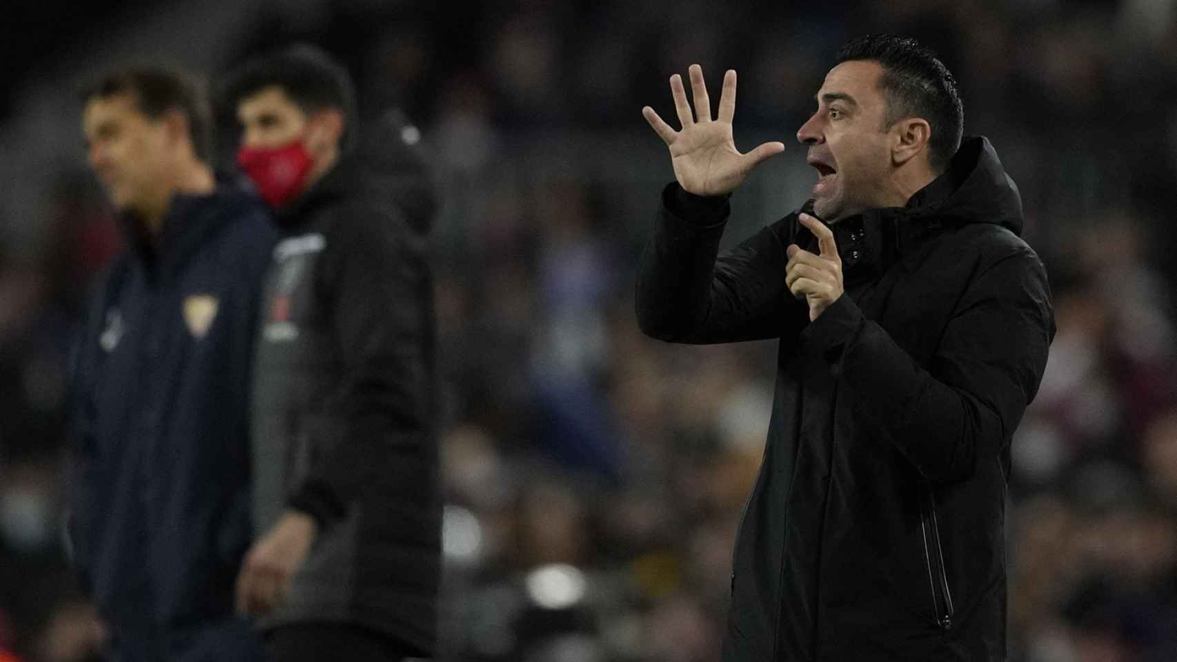 Xavi Hernández durante el partido entre el Barça y el Sevilla