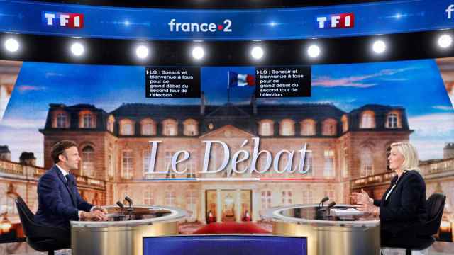 Los candidatos a la presidencia francesa Emmanuel Macron y Marine Le Pen.