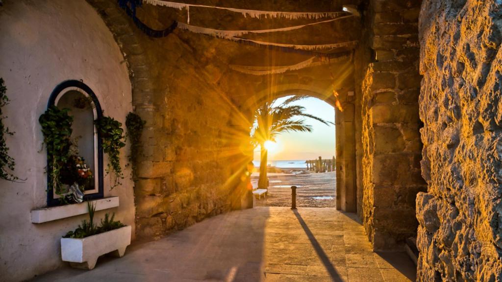 Vista de una puesta de sol en la playa de Tabarca.