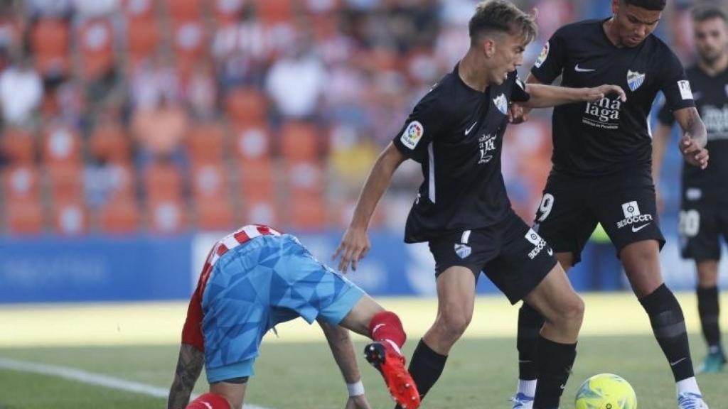 Paulino y Loren durante el Lugo - Málaga de la última jornada