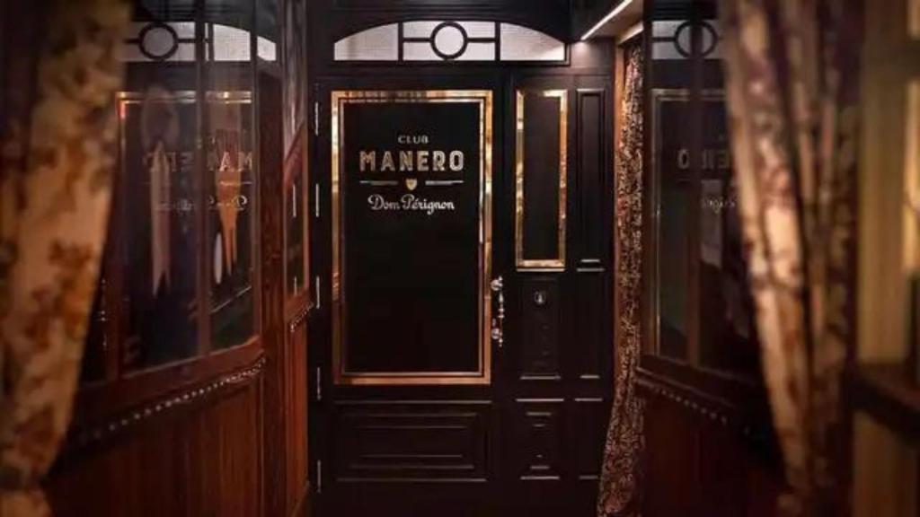 Entrada club Manero.