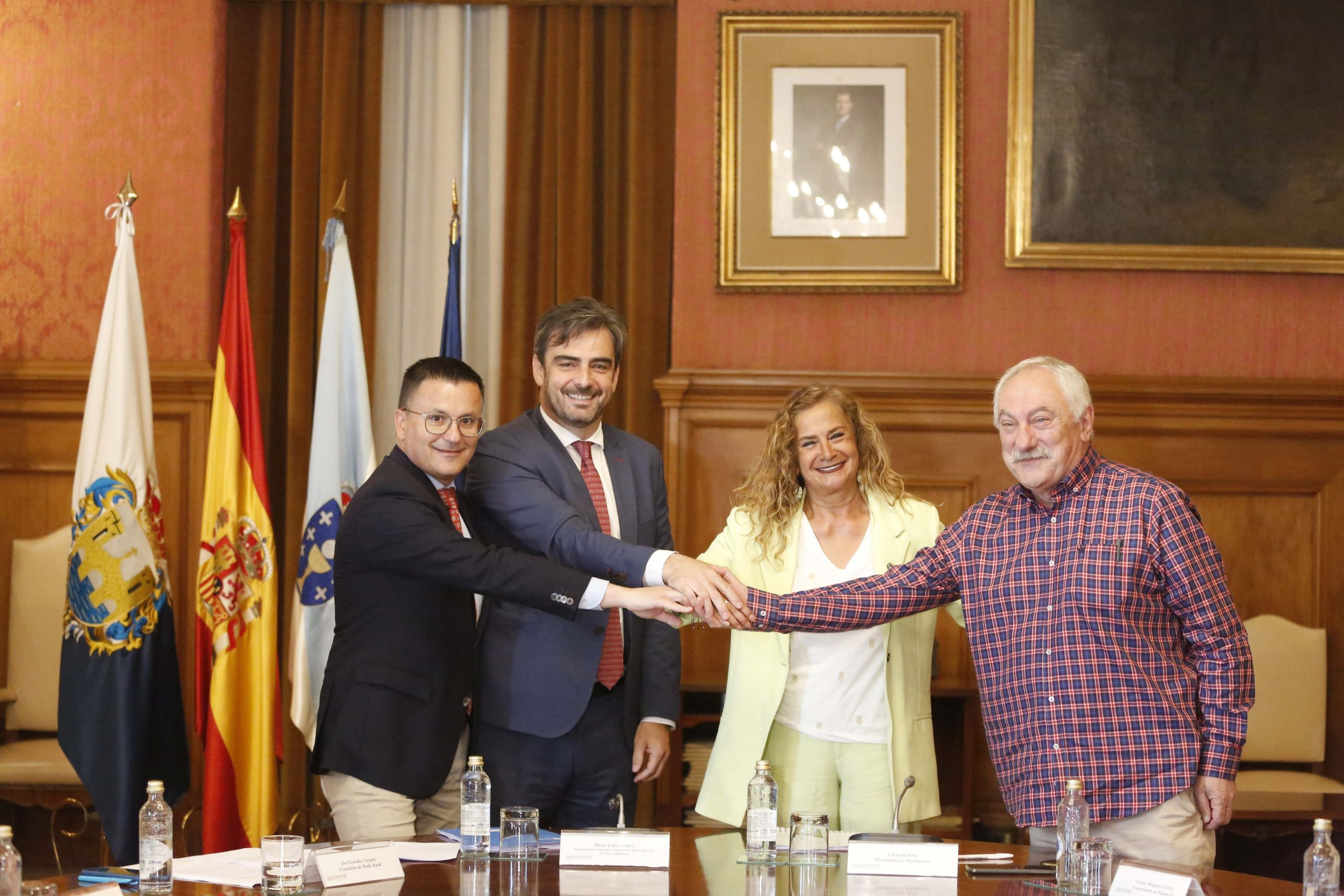 Imagen de la firma del acuerdo entre Xunta y Diputación.