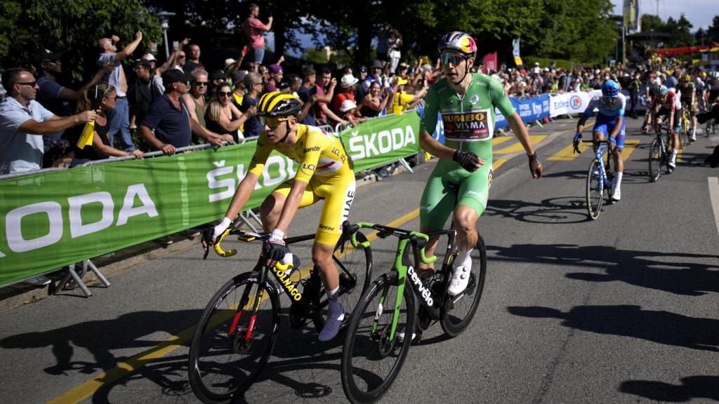 Tadej Pogacar y Wout Van Aert en Lausana.