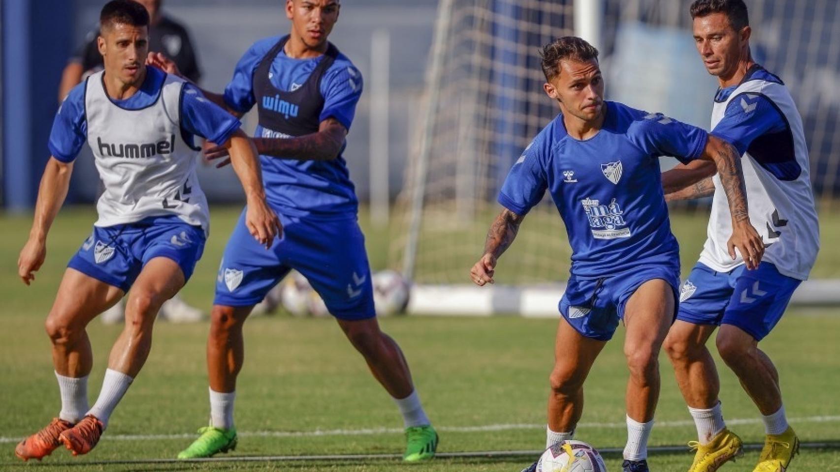 Bustinza, Zúñiga, Villalba y Rubén Castro en un entrenamiento del Málaga CF