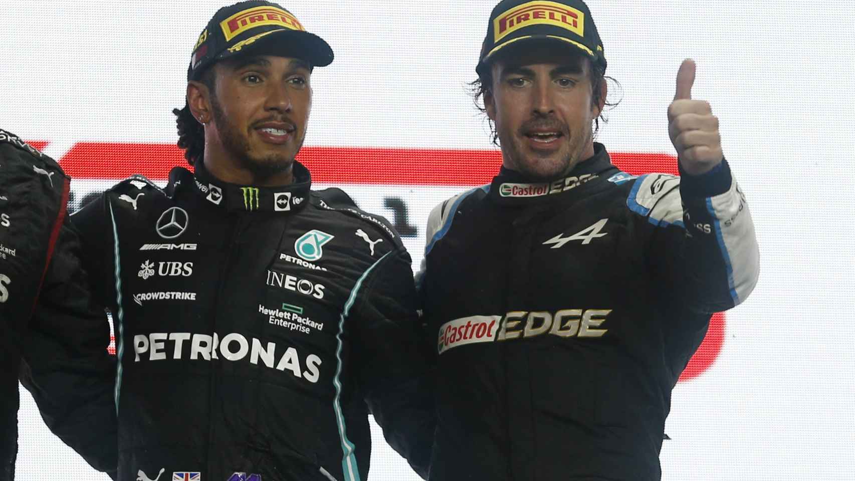 Lewis Hamilton y Fernando Alonso, en el podio