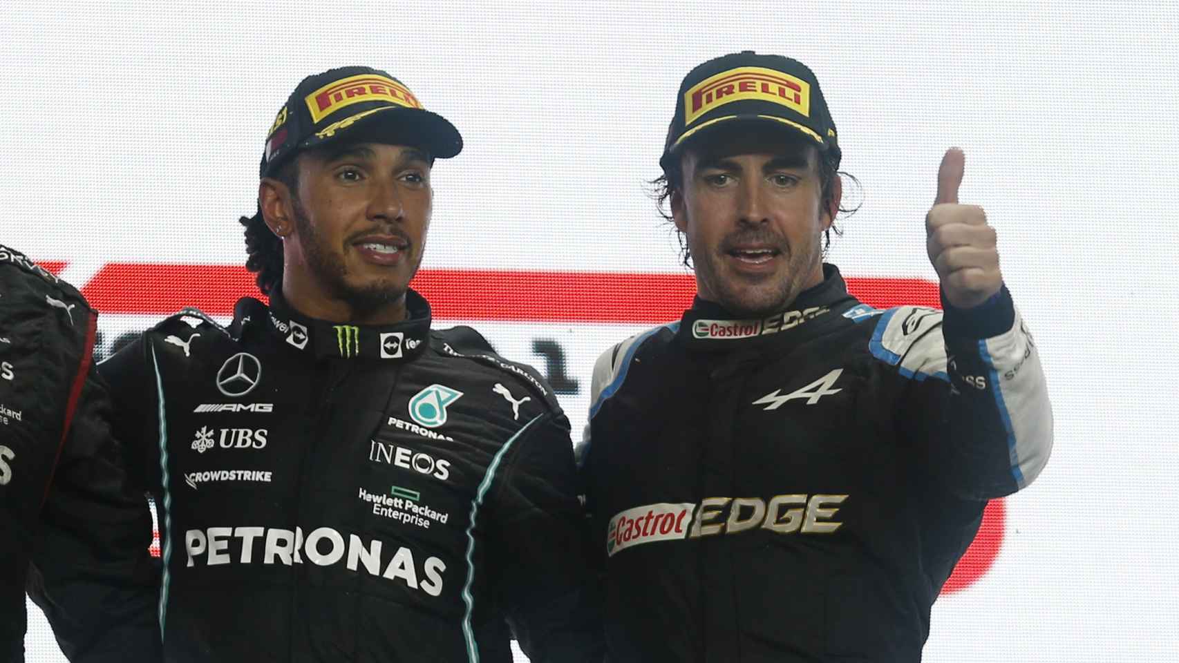 Lewis Hamilton y Fernando Alonso, en el podio