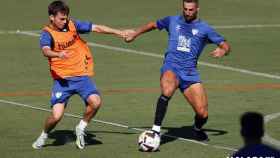 Aleix Febas y Fran Sol durante un entrenamiento con el Málaga CF