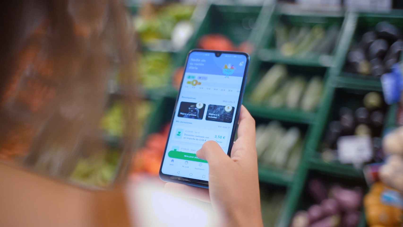 Imagen corporativa de la app en un supermercado.
