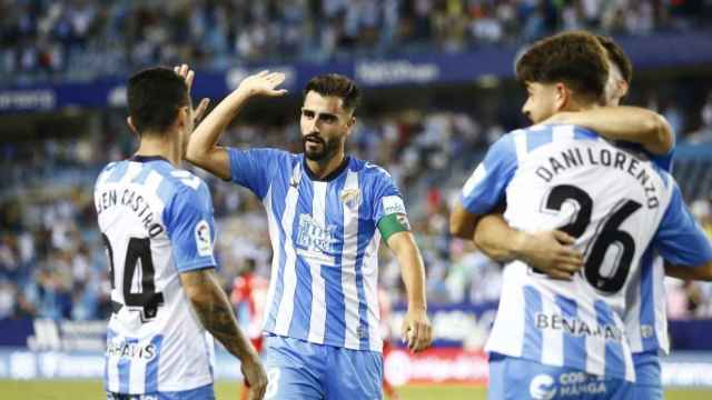 Los jugadores del Málaga CF celebran un gol contra el Lugo