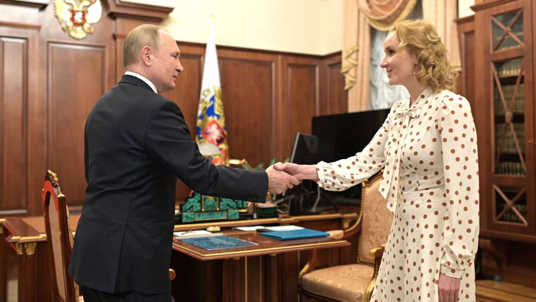 Maria Lvova-Belova y Vladimir Putin.