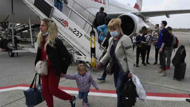 Refugiados ucranianos llegando a un aeropuerto de Duesseldorf (Alemania) en mayo de 2022