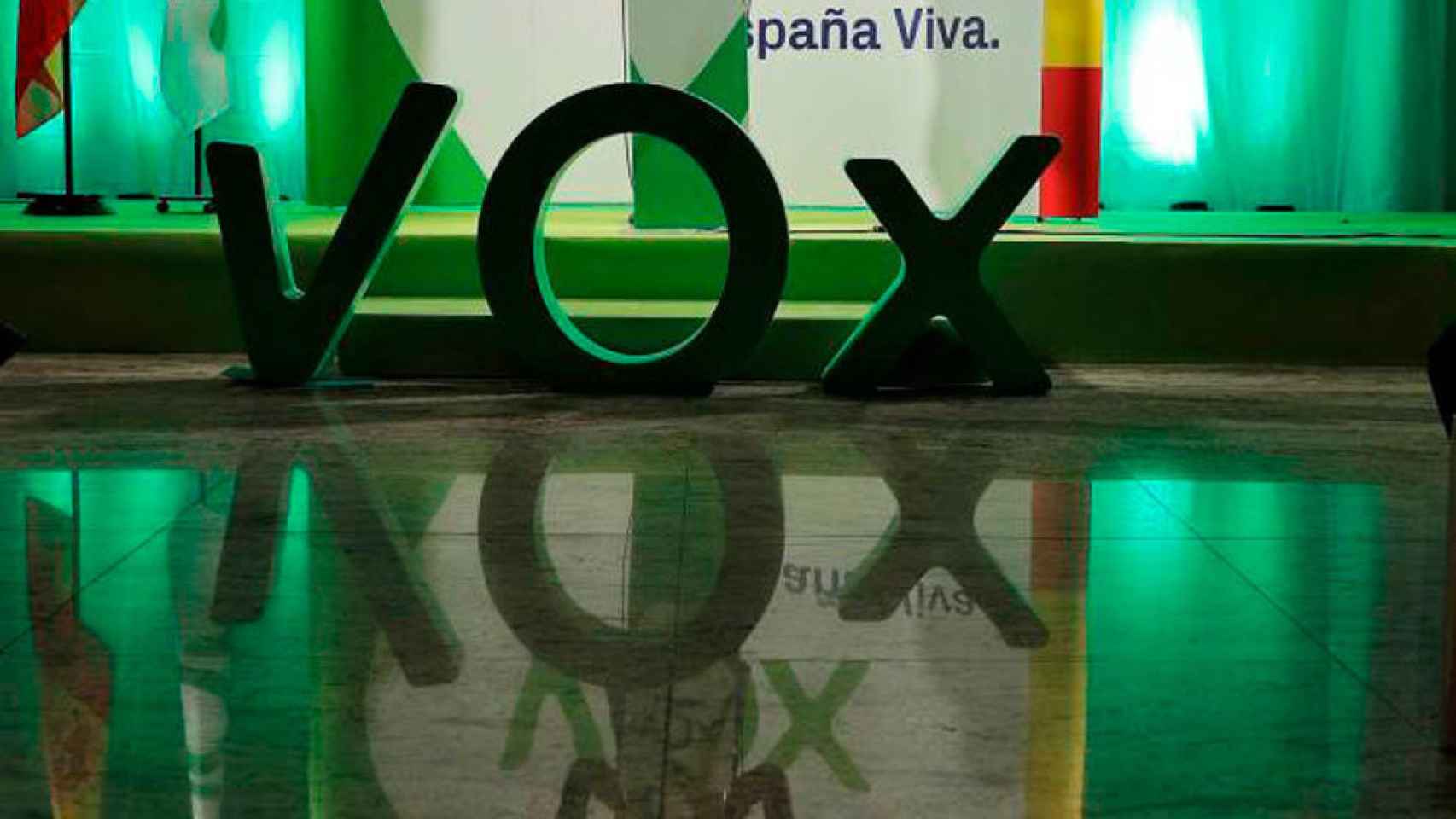 Logotipo de Vox en un acto del partido.