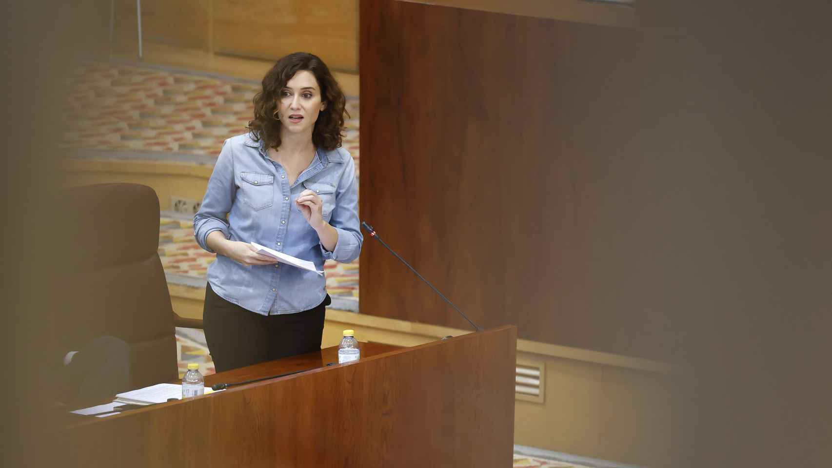 Isabel Díaz Ayuso este jueves en el pleno de la Asamblea de Madrid durante su respuesta a la oposición.
