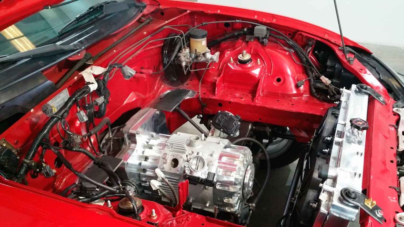 El motor e-REX en el Mazda MX-5.