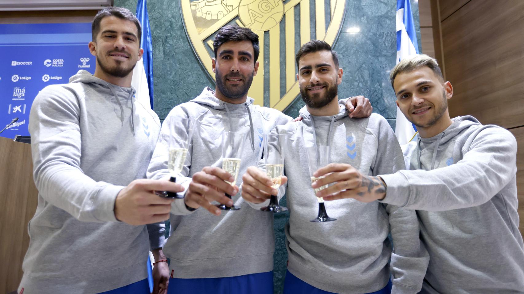 Rubén Yáñez, Escassi, Luis Muñoz y Villalba, jugadores del Málaga CF