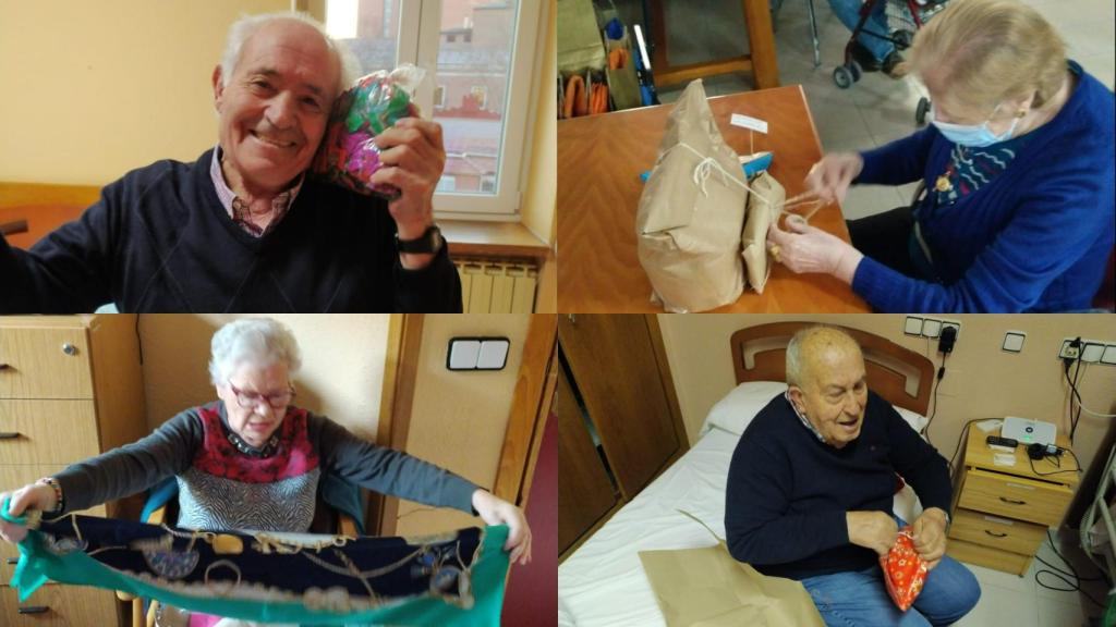 Las personas mayores recibiendo los regalos de los Reyes Magos