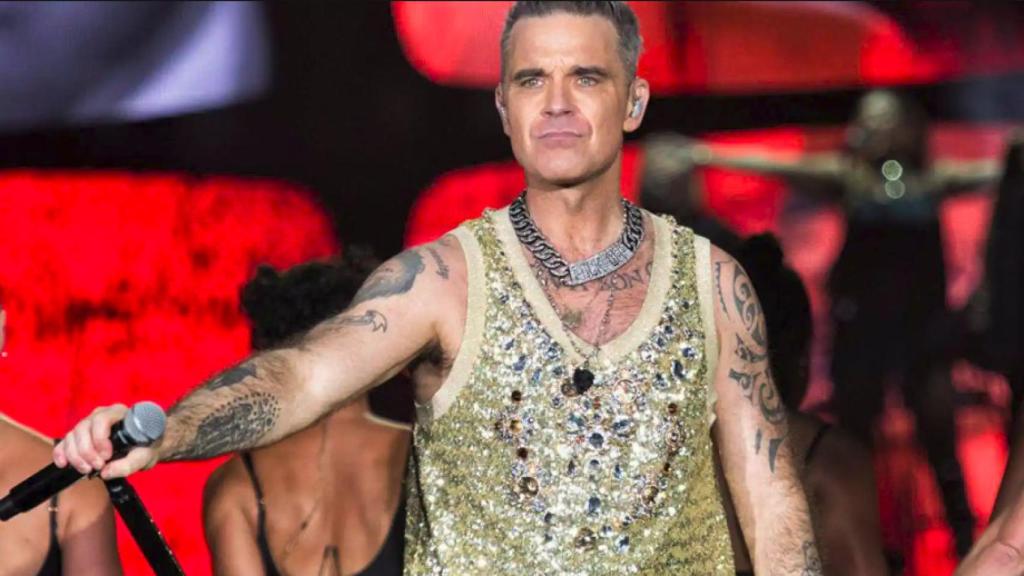 Robbie Williams durante un concierto